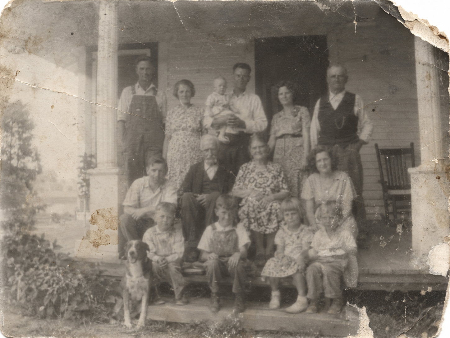 Three generations on the porch, before restoration